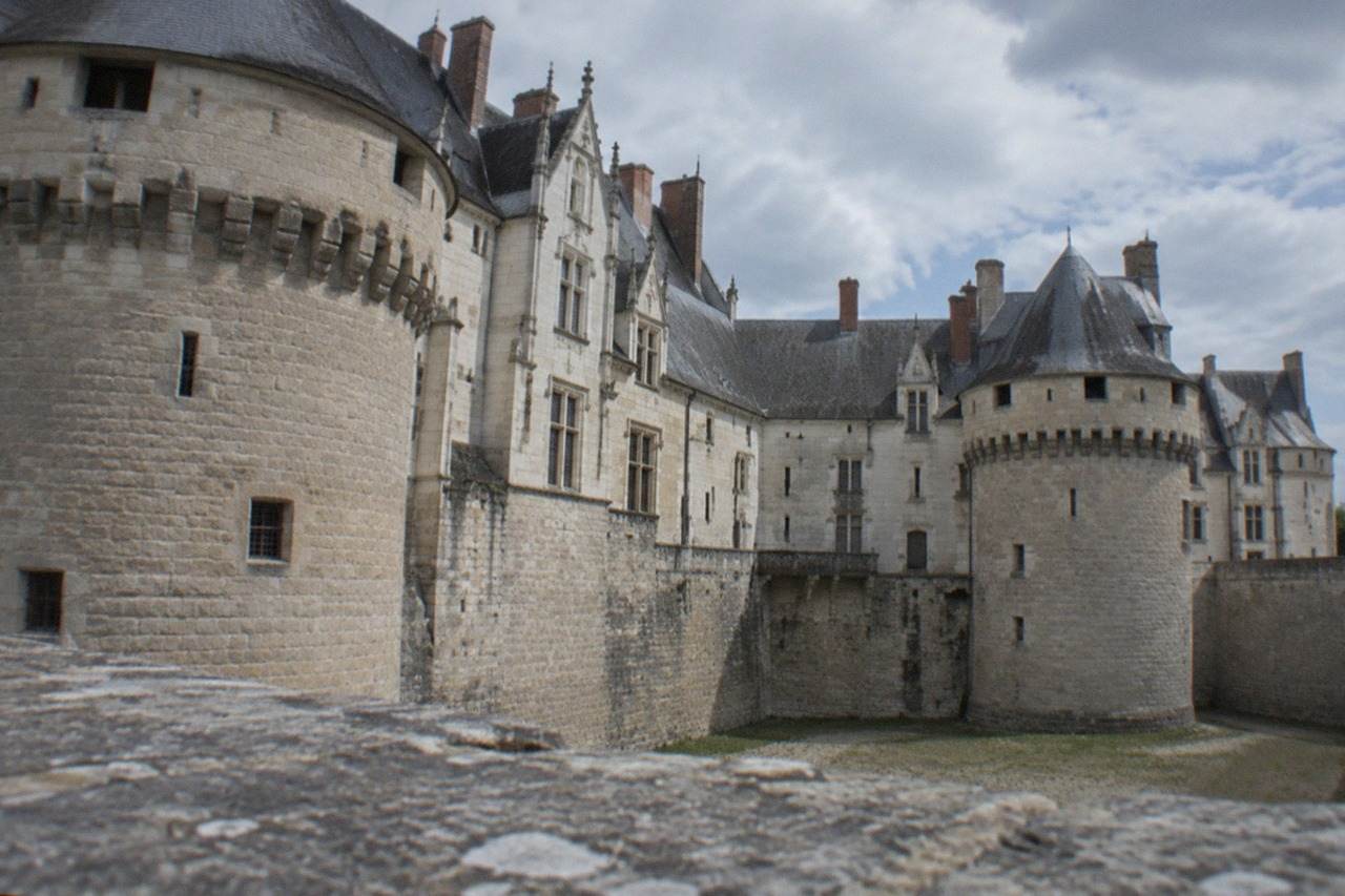 The ramparts and towers of the Château des ducs de Bretagne in Nantes seen from the dry moat