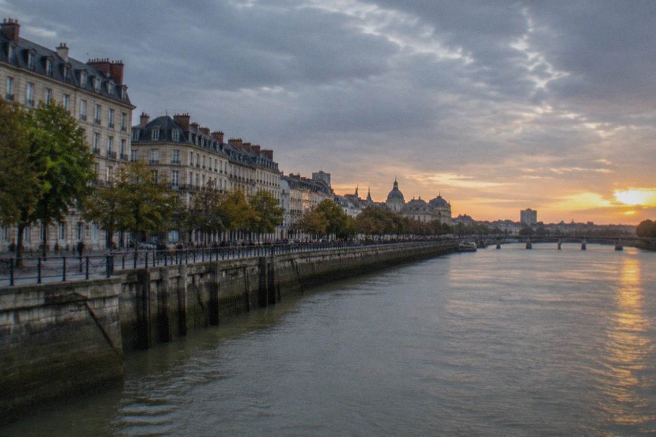 View over the Loire river and the old quays of Nantes at golden hour