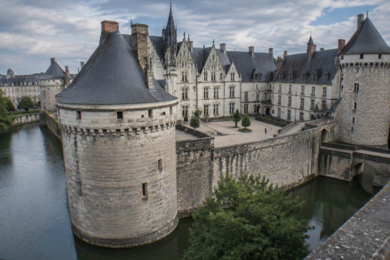 The towers and ramparts of the Château des ducs de Bretagne in Nantes on a bright afternoon