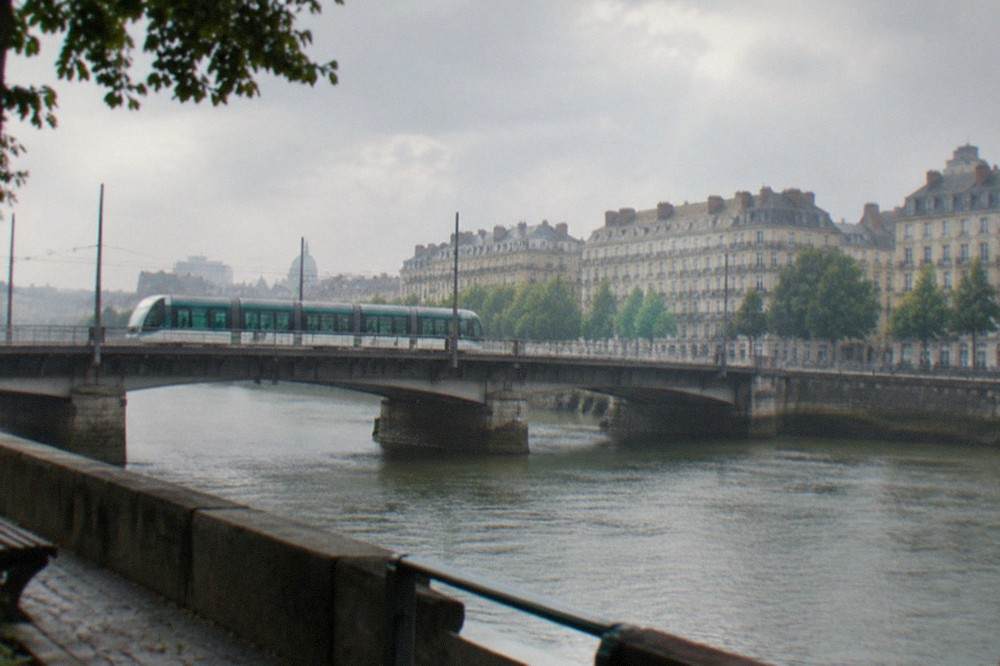 A Naolib tram crossing one of Nantes bridges over the Loire towards the Île de Nantes
