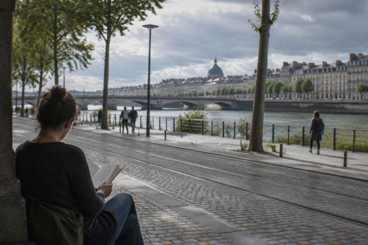A reader asking why Brittany feels culturally separate from the rest of France, with a map of the French regions spread across the table.