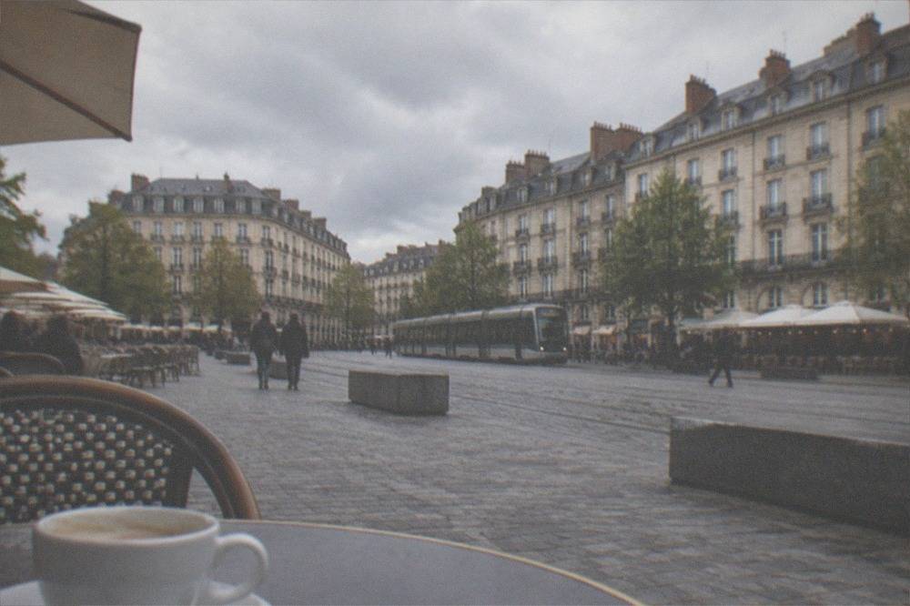 Terrace tables and crêperie fronts around the old marketplace square in Nantes