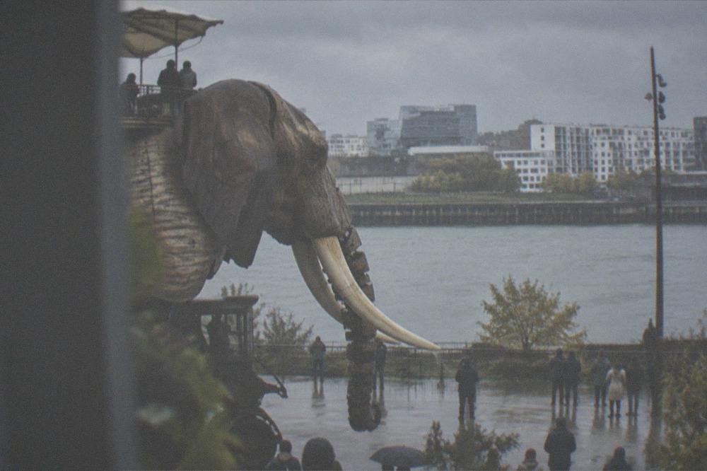 The mechanical elephant and modern buildings of the Ile de Nantes seen across the Loire from central Nantes