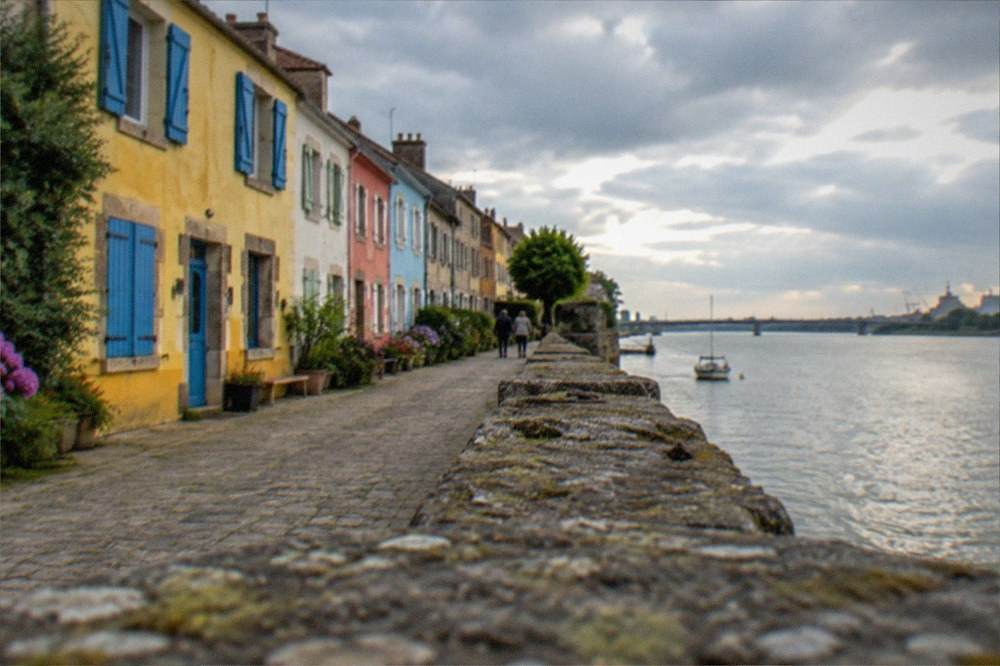 Colourful painted house facades along the riverside quays of Trentemoult near Nantes