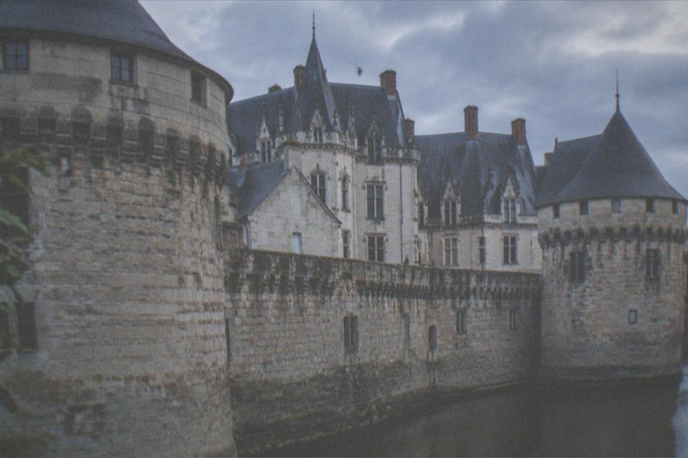 The ramparts and slate roofs of the Château des ducs de Bretagne on a clear morning