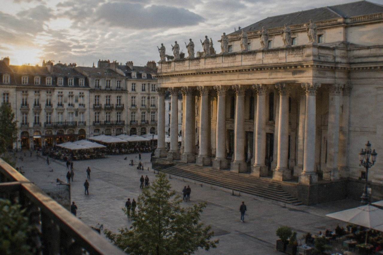 The stone facade and columns of the Theatre Graslin opera house on Place Graslin in Nantes