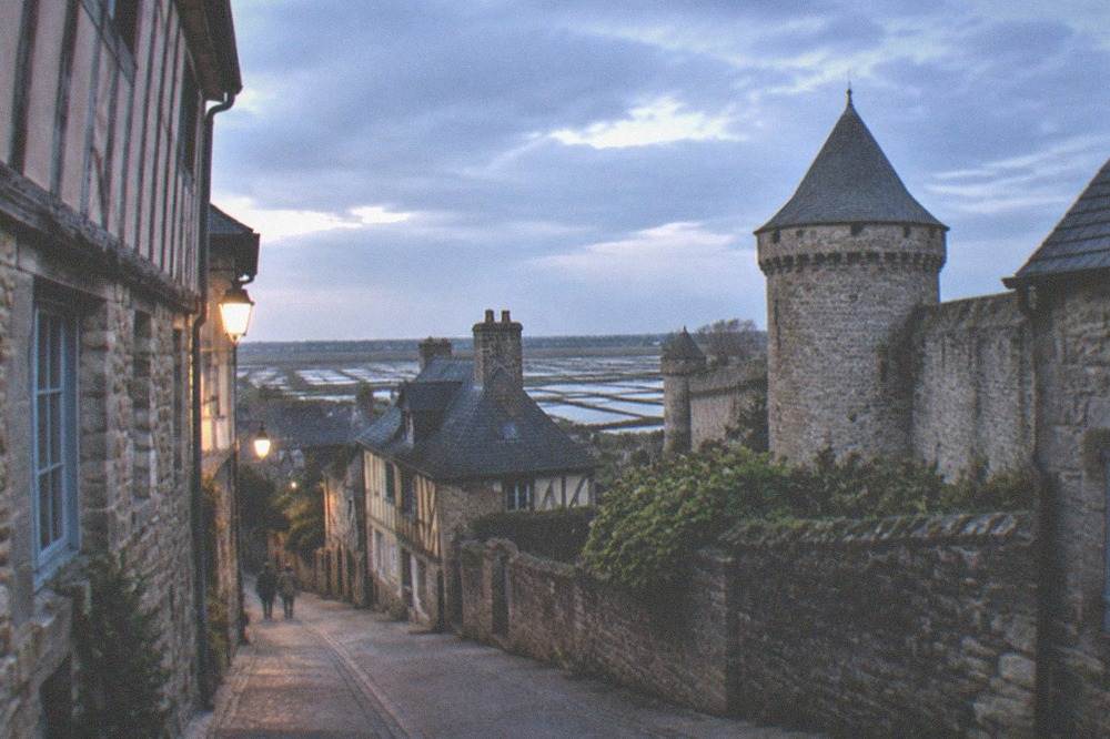 Narrow granite street inside Guerande with half-timbered and stone houses