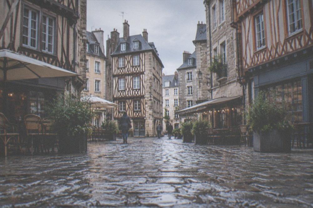 Cobbled pedestrian lanes in the Bouffay old town of Nantes with half-timbered buildings above