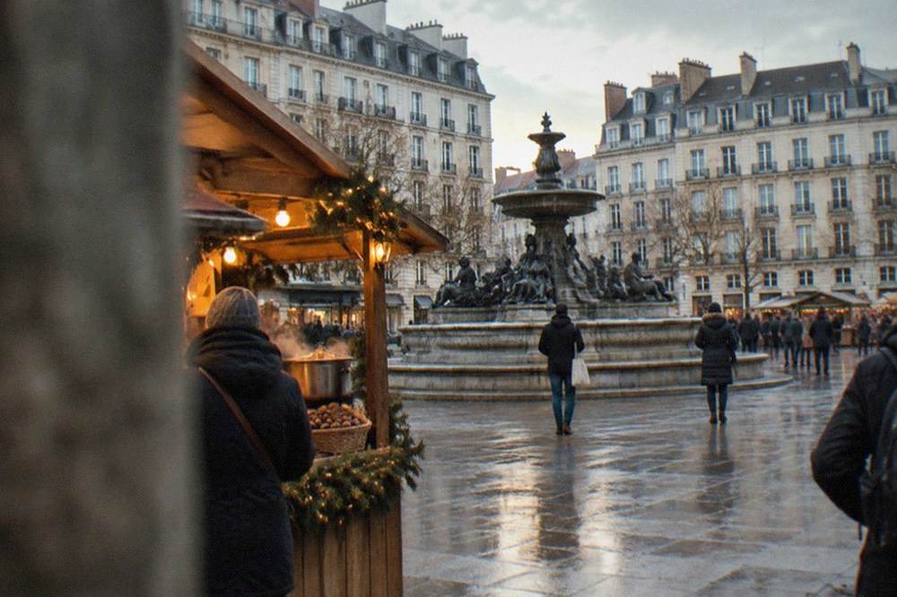 A stall of mulled wine and roasted chestnuts glowing at a winter market