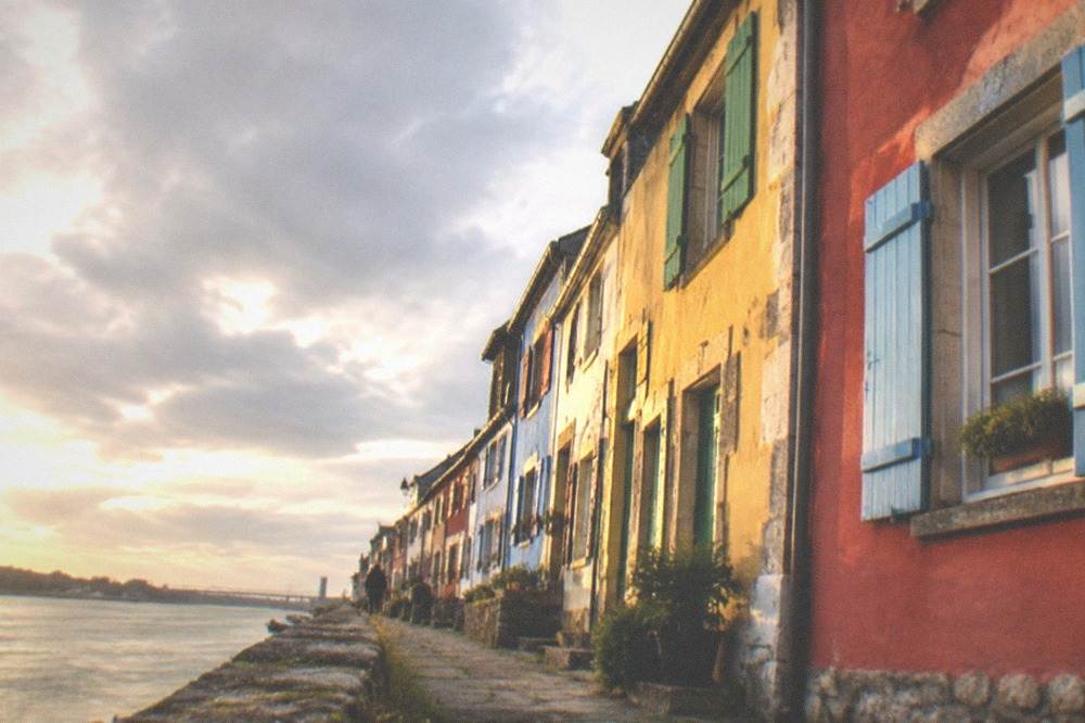 Colourful fishermen's houses along a waterfront street in the Trentemoult quarter