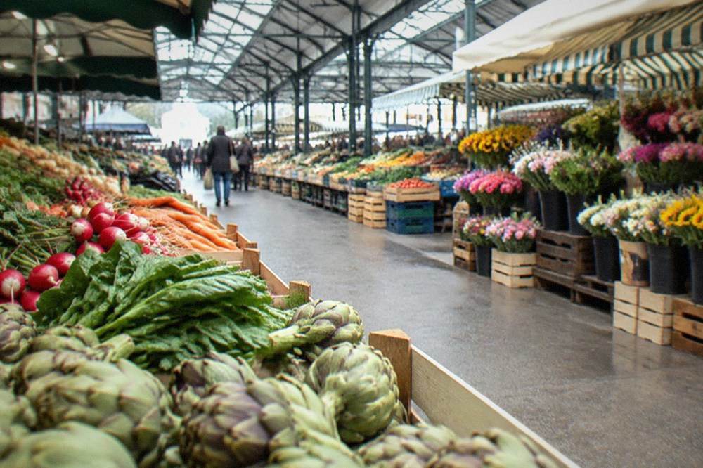 Stalls of fresh produce and flowers at Talensac market in Nantes