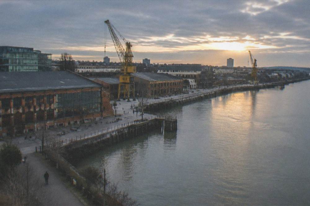 Evening light on the Loire with the cranes and warehouses of the Ile de Nantes skyline