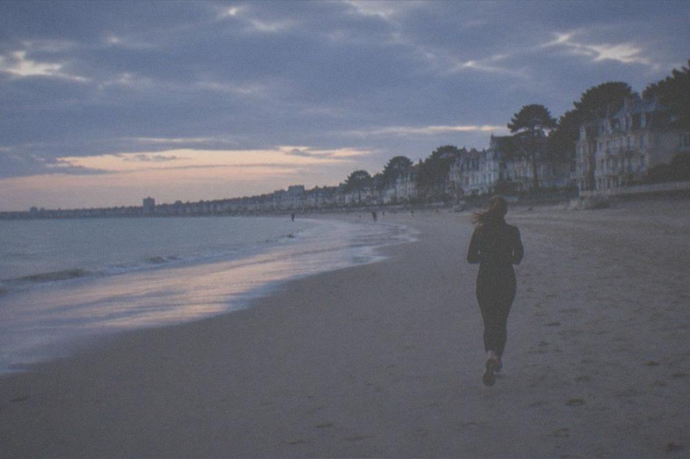 The wide sandy beach and seafront villas of La Baule in late afternoon light