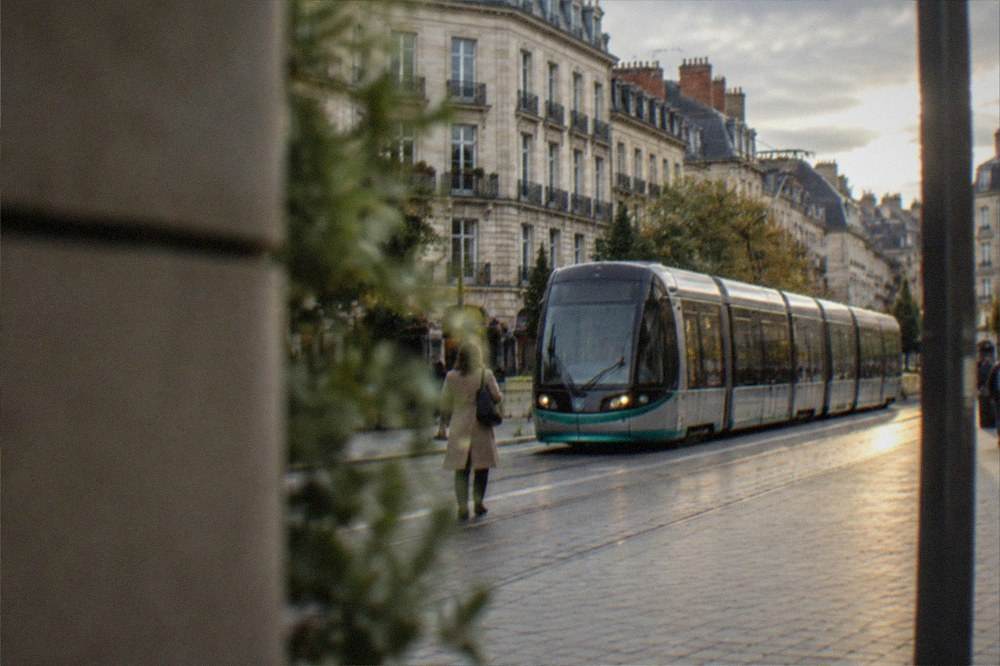 A Nantes tram passing through a pedestrianised street in the city centre